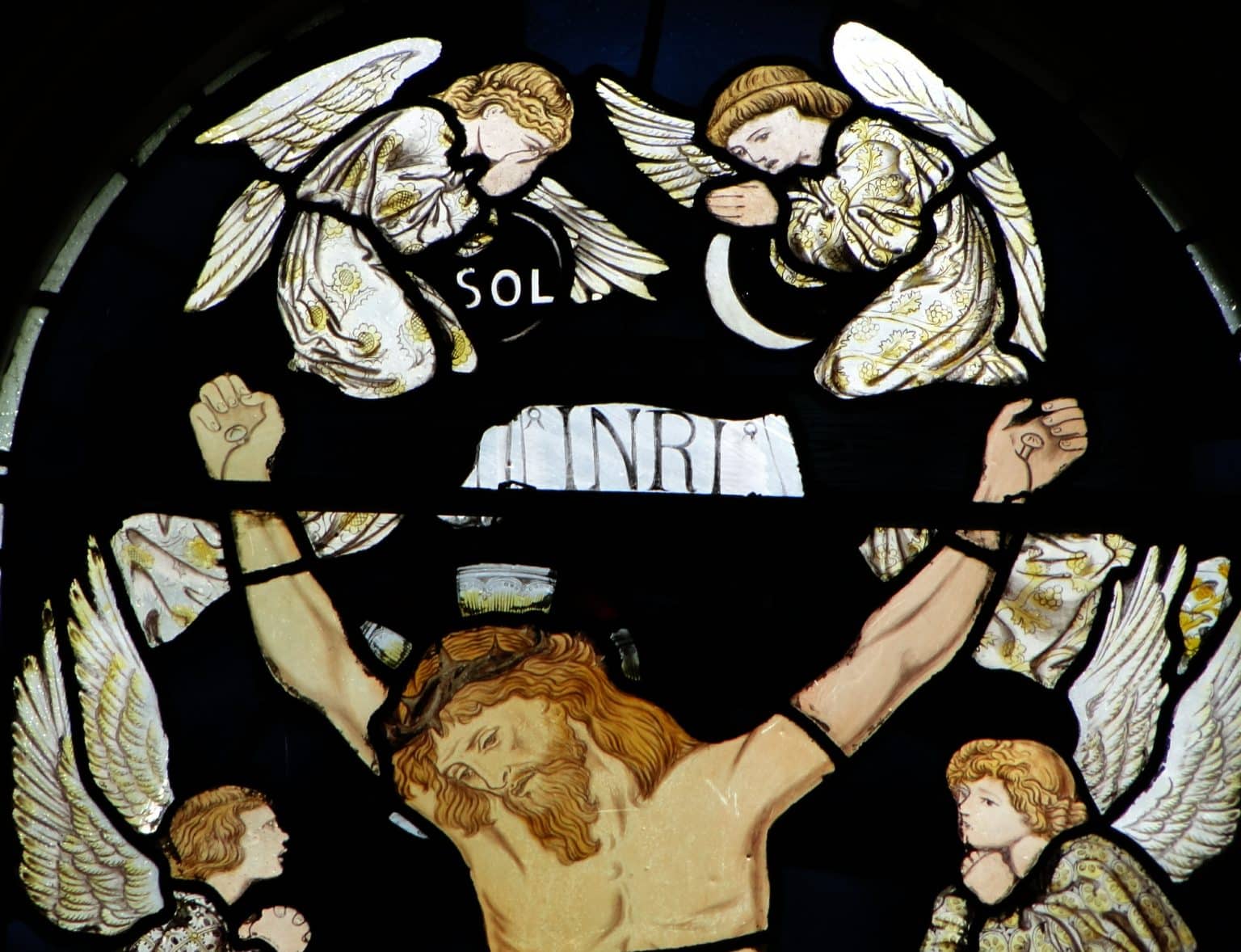 The crucifixion of Jesus, the central panel on the East Window in the College Chapel