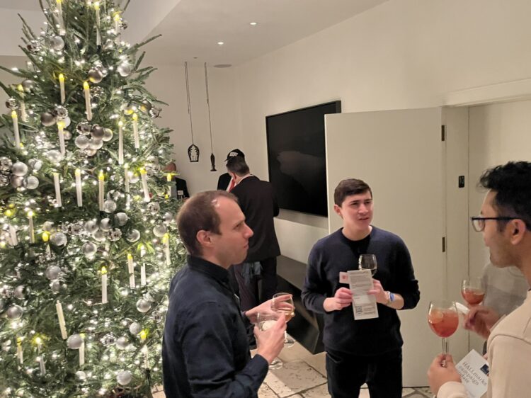 Guests at a Christmas drinks reception