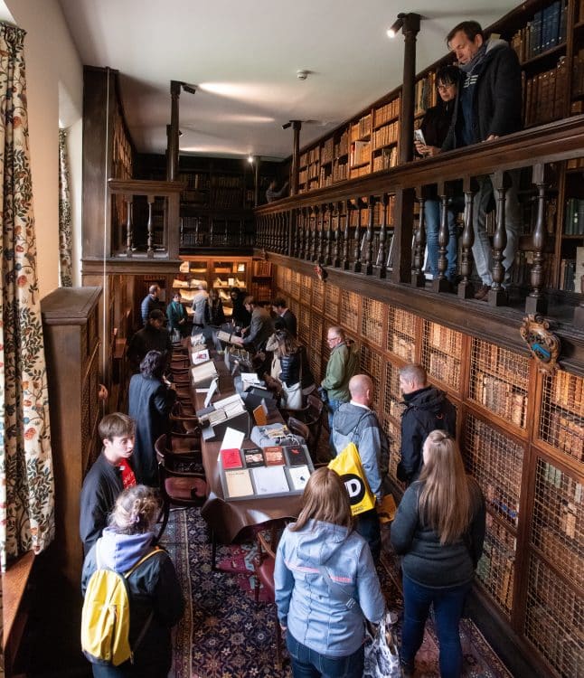 Visitors explore the Old Library at Access Hall Areas Visitors explore the Old Library at Access Hall Areas