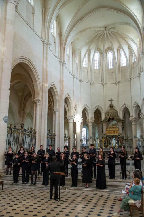 Pontigny tour 2024 4 The St Edmund Hall Choir performing inside Pontigny Abbey