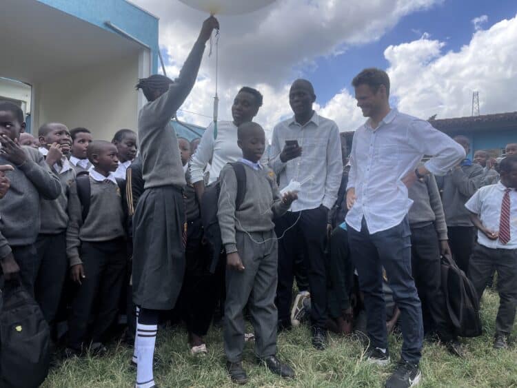 REACH 3 A group of REACH team members and school children undertaking field research in Kenya