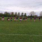 The men's rugby team warming up before the semi-final