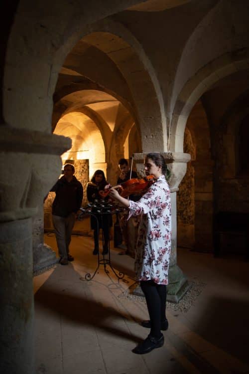 Postgraduate student Andrea Fortier performs a viola recital in the Crypt Postgraduate student Andrea Fortier performs a viola recital in the Crypt